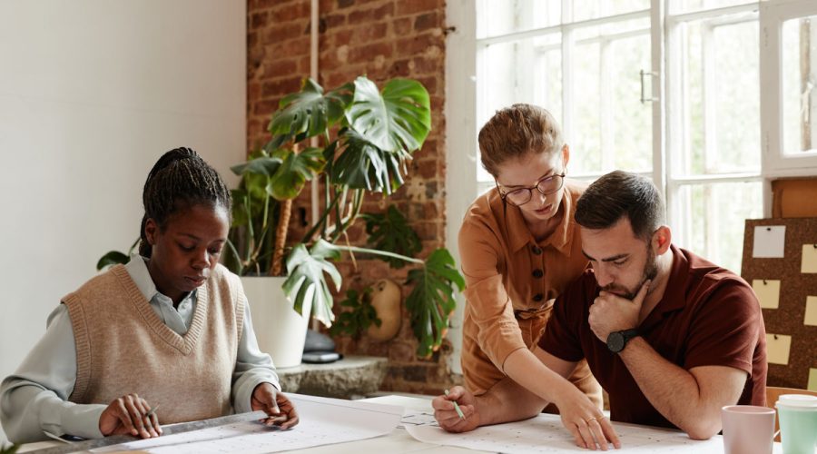 Diverse group of designers and architects working in meeting at office