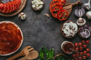 Backgroung 02top-view-of-various-pizza-ingredients-on-concrete-2024-11-17-09-45-35-utc