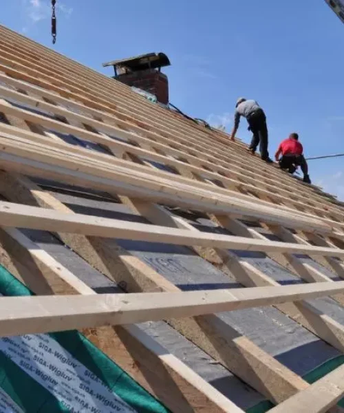 two-builder-on-an-open-rooftop