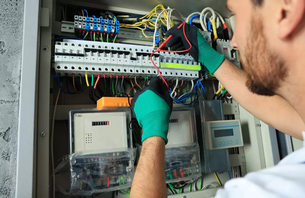 electrician-checking-electric-current-with-multime-2026-03-27-01-41-11-utc
