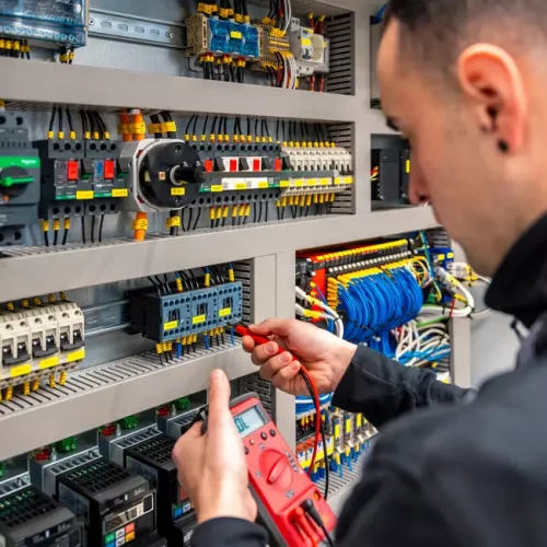 close-up-of-an-engineer-repairing-an-electrical-sy-2026-03-16-05-14-58-utc