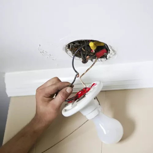 electrician-at-work-installing-a-light-fixture-2026-03-09-01-55-13-utc